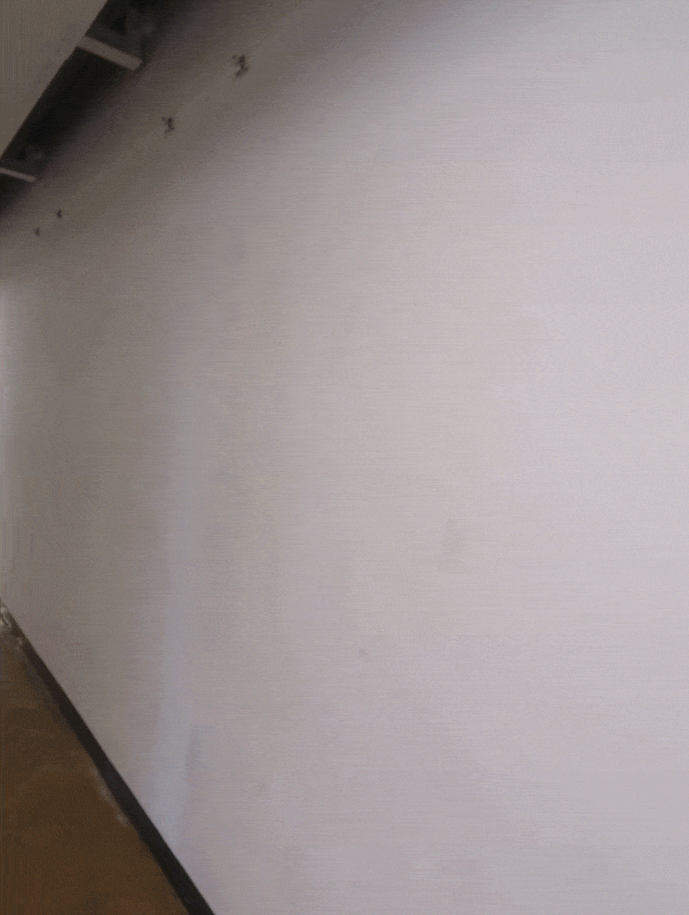Animation of a series of empty white walls.